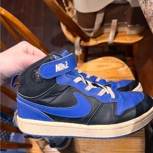 Kids blue and black Nikes